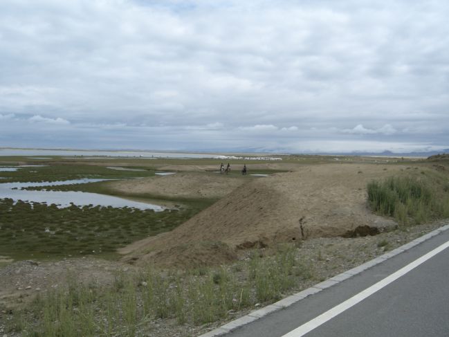  2006:09:03 23:06:24   Wetlands  and horsemen adjacent to Beach Ridge Outcrop - East Side of Lake.jpg